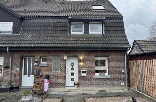 Haus kaufen in 41836 Hückelhoven, Gepflegtes Reihenendhaus mit Garten und Garage in ruhiger Lage von Hückelhoven-Schaufenberg