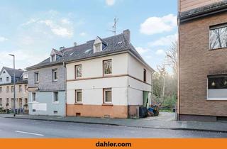 Doppelhaushälfte kaufen in 40822 Mettmann, Doppelhaushälfte in zentraler Lage mit großem Garten und Ausbaupotenzial