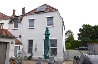 Doppelhaushälfte kaufen in 26954 Nordenham, Nordenham - Modernisierte Doppelhaushälfte mit Garage, Innenhof und Garten