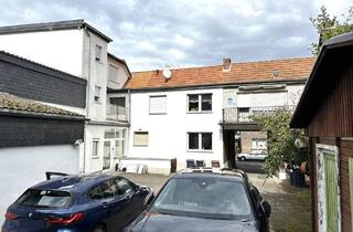 Haus kaufen in 50354 Hürth, Hürth - Wohn- und Geschäftshaus + Garagen + 1.186 m² großes Grundstück zu verkaufen