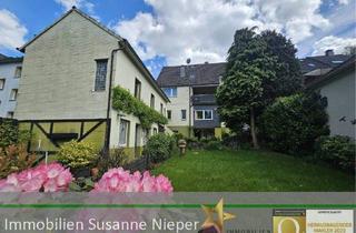 Mehrfamilienhaus kaufen in 42651 Solingen, Solingen - Vielseitig nutzbare Liegenschaft - Attraktives Mehrfamilienhaus mit Garten und separatem Gewerbehaus