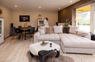 Wohnung kaufen in 32312 Lübbecke, Lübbecke - Charmante Eigentumswohnung mit Balkon, Terrasse und eigenem Garten in Lübbecke