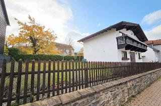 Einfamilienhaus kaufen in 61250 Usingen, Usingen - Lichtdurchflutetes Einfamilienhaus mit Doppelgarage in ruhiger familienfreundlicher Umgebung