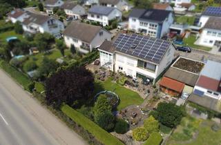 Haus kaufen in 89604 Allmendingen, Allmendingen - Wohnhaus mit drei Wohnungen, Doppelgarage und mehrere Stellplätze