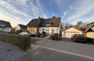 Haus kaufen in 59320 Ennigerloh, Ennigerloh - Zweifamilienhaus auf großem Grundstück und guter Substanz in Ennigerloh!