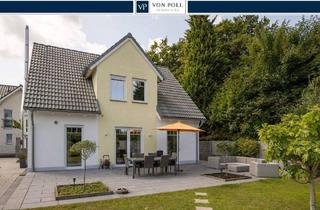 Einfamilienhaus kaufen in 41515 Grevenbroich, Grevenbroich - Neuwertiges, freistehendes Einfamilienhaus mit Pool und tollem Garten in zentraler Lage