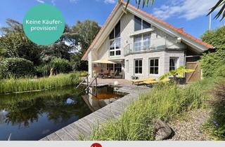 Einfamilienhaus kaufen in 28816 Stuhr, Stuhr - Exklusives Wohnhaus mit Büro und traumhaftem Schwimmteich!