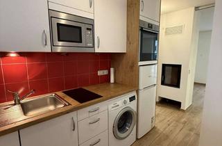 Wohnung kaufen in Steinhauserstraße 25, 81677 Bogenhausen, Ruhiges Wohnen in Bogenhausen: Echtsteinheizung, Holzoptik-Fliesen, Garten.