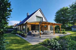 Einfamilienhaus kaufen in 23626 Ratekau, Viel Raum zum Leben: Einfamilienhaus mit Doppelgarage auf großem Grundstück