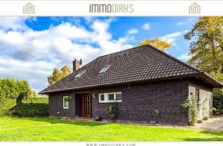 Haus kaufen in 26789 Leer, Bingum: Attraktiver Bungalow mit 2 Kaminen, Sonnenterrasse & großem Garten