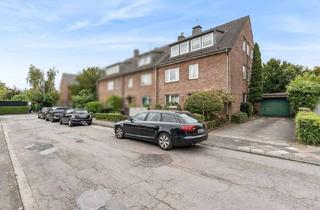 Mehrfamilienhaus kaufen in 40667 Meerbusch, Stilvolles Mehrfamilienhaus: 3 Parteien, Gartenidylle und Garage in Meerbusch-Büderich