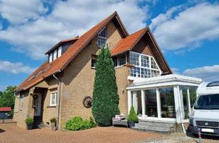 Haus kaufen in 32479 Hille, Hille - Einziehen und wohlfühlen: großzügiges Zweifamilienhaus in Hille-Oberlübbe