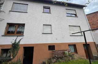 Einfamilienhaus kaufen in 35444 Biebertal, Biebertal - Gut geschnittenes, sanierungsbedürftiges Einfamilienhaus