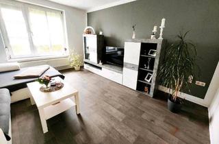 Wohnung kaufen in 04758 Oschatz, Oschatz - Geräumige 3 Zimmer Wohnung mit Garage und Gartenanteil