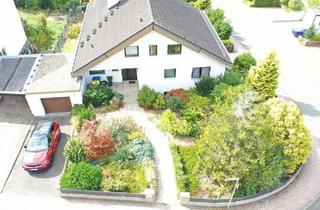 Einfamilienhaus kaufen in 65527 Niedernhausen, Niedernhausen - freistehendes EFH mit Garage und separater Einliegerwohnung