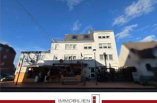 Wohnung kaufen in 52531 Übach-Palenberg, Attraktive Eigentumswohnung mit Dachterrasse und Garage in gepflegtem Wohn- und Geschäftshaus