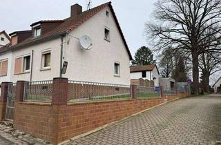 Doppelhaushälfte kaufen in 67283 Obrigheim, Achtung Preisreduzierung - Vermietete Doppelhaushälfte mit großem Grundstück & Baureserve