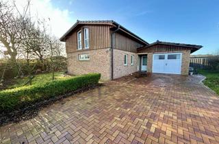 Haus kaufen in Zum Wasserkoog 16, 25761 Warwerort, Nordsee pur: Exklusives Ferienhaus am Deich in begehrter Ferienhaussiedlung