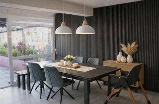 Reihenhaus kaufen in 42897 Remscheid, Viel Raum zum Leben: Modernisiertes Reihenhaus mit Garten und flexibler Raumaufteilung