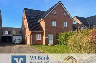 Doppelhaushälfte kaufen in 25899 Niebüll, Kapitalanlage: Hochwertige vermietete Doppelhaushälfte mit Garage in attraktiver Lage