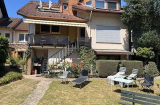 Wohnung kaufen in 63486 Bruchköbel, 2-Zimmer-Wohnung mit Stellplatz, Terrasse und direktem Zugang zum Garten am Naturschutzgebiet