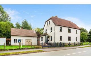Haus kaufen in 33818 Leopoldshöhe, Charmantes Zweifamilienhaus mit großem Grundstück in ruhiger Lage