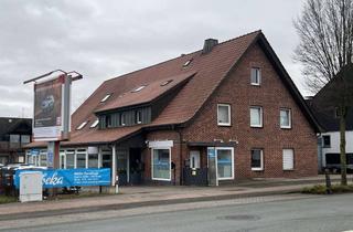 Haus kaufen in Raesfelder Straße 27, 46325 Borken, Renovierungsbedürftiges Wohn- und Geschäftshaus mit 4 Ladenlokalen und 2 Garagen in Borken