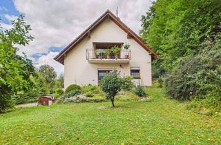 Haus kaufen in 35753 Greifenstein, Greifenstein - Zwei idyllische Einfamilienhäuser am Waldrand von Greifenstein-Ulm