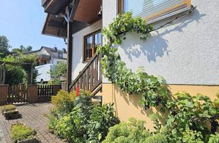 Haus kaufen in 61276 Weilrod, Weilrod / Niederlauken - Viel Platz für die Familie, idyllisch im Grünen mit moderner EBK, großem Carport und schönem Garten