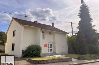 Haus kaufen in 56566 Neuwied, Neuwied - Zweifamilienhaus mit großem Garten und zusätzlichem Bauplatz