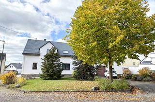 Einfamilienhaus kaufen in 56825 Schmitt, Einfamilienhaus mit 2 Garagen und Garten in ländlicher Umgebung in der Eifel