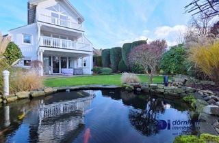 Wohnung kaufen in 44267 Dortmund, Wohnen wie im eigenen Haus – besondere Erdgeschosswohnung mit Privatgarten