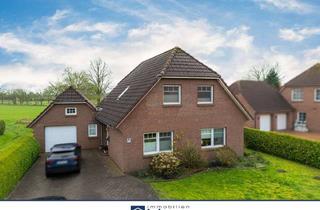 Einfamilienhaus kaufen in 26607 Aurich, Modernisiertes Einfamilienhaus mit Garage und unverbaubarem Grundstück