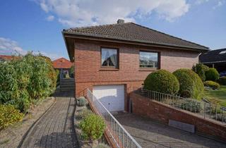 Haus kaufen in 27624 Drangstedt, Drangstedt - Volksbank Immobilien: Ebenerdig wohnen, bequem parken: Bungalow mit Tiefgarage!