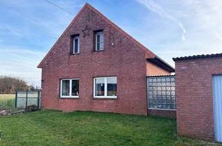 Einfamilienhaus kaufen in 46514 Schermbeck, Charmantes Einfamilienhaus mit Garage und Pferdeweide in ländlicher Wohnlage!