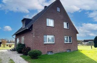 Haus kaufen in 46514 Schermbeck, Vermietetes Zweifamilienhaus mit Gartenanteilen und zwei Garagen im ländlichen Außenbereich!
