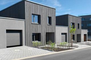 Haus kaufen in 75382 Althengstett, Architektenhaus mit Charakter – massiv gebaut, edle Holzfassade, großzügige Raumkonzepte