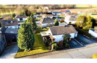 Haus kaufen in 56244 Wölferlingen, Vielseitiges Ein-/Zweifamilienhaus mit großem Grundstück zwei Garagen und viel Potential!