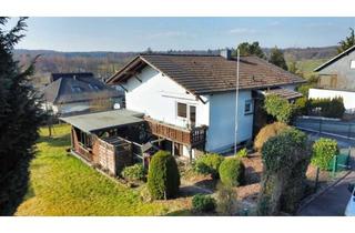 Haus kaufen in 56244 Wölferlingen, Vielseitiges Ein-/Zweifamilienhaus mit wundervollen Grundstück zwei Garagen und viel Potential!