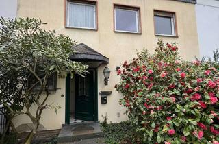 Haus kaufen in Niederurseler Landstraße 148, 60439 Niederursel, Reihenmittelhaus mit großem Garten und Balkon