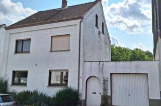 Haus kaufen in 65551 Limburg, Ein-/ Zweifamilienhaus mit Schwimmhalle und Garage in Lindenholzhausen