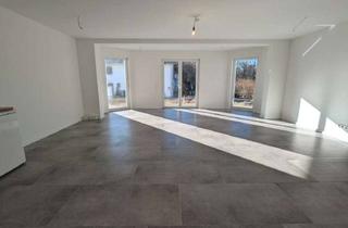 Wohnung kaufen in 83670 Bad Heilbrunn, AM FUSSE DER BERGE - MIT SONNIGEM SÜD-WEST GARTEN UND GROSSEM HOBBYKELLER