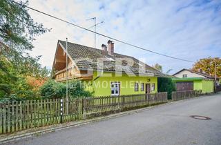 Einfamilienhaus kaufen in 94327 Bogen, Vielseitig nutzbares Einfamilienhaus in Bogen mit 2 Garagen und PV-Anlage, Renovierungsbedarf