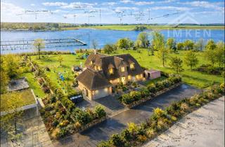 Villa kaufen in 24376 Kappeln, Ostseefjord Schlei: Hochwertige Reetdachvilla im Sylter-Stil mit eigenem Ufer-Grundstück.