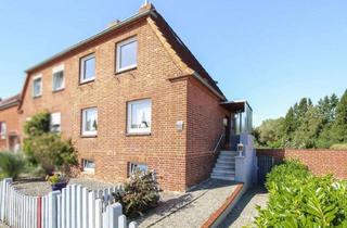 Doppelhaushälfte kaufen in 23560 Moisling, Charmante Doppelhaushälfte auf Erbpachtgrund mit großem Garten und Gestaltungspotenzial