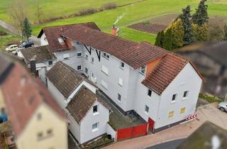 Einfamilienhaus kaufen in 65614 Beselich, Attraktives Investitionsobjekt mit stabiler Mieterstruktur