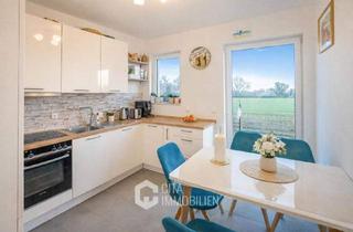 Wohnung kaufen in 60437 Frankfurt, Frankfurt am Main - KfW-55 Neubau: 4-Zimmer-Gartenwohnung in Frankfurt-Nieder-Eschbach