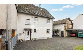 Haus kaufen in 35606 Solms, Solms - Charmantes EFH mit Ausbaupotenzial in zentraler Wohnlage