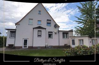 Haus kaufen in 14712 Rathenow, Ein- bis Zweifamilienhaus mit Vollkeller, zwei Garagen und Ausbaureserve