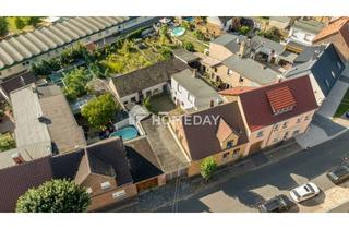 Einfamilienhaus kaufen in 06808 Bitterfeld-Wolfen, Einfamilienhaus mit Scheune, Garten, Charme und viel Potenzial – Ihr Projekt mit Zukunft